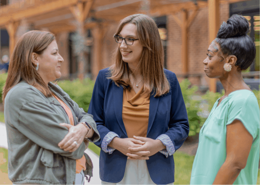 Sarah speaking to group