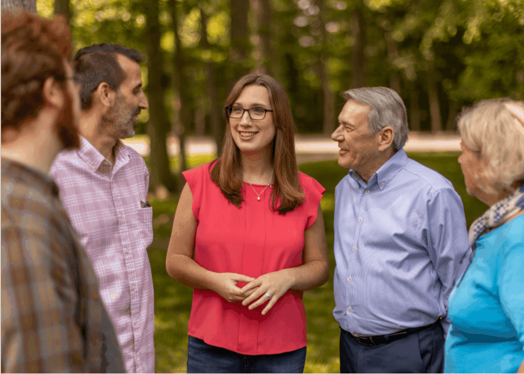 Sarah speaking to group